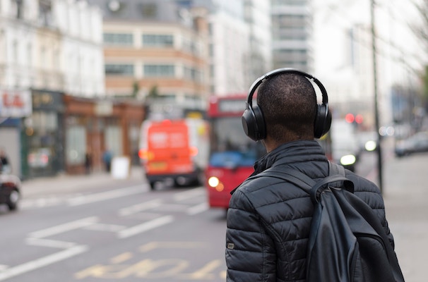man listening with headphones